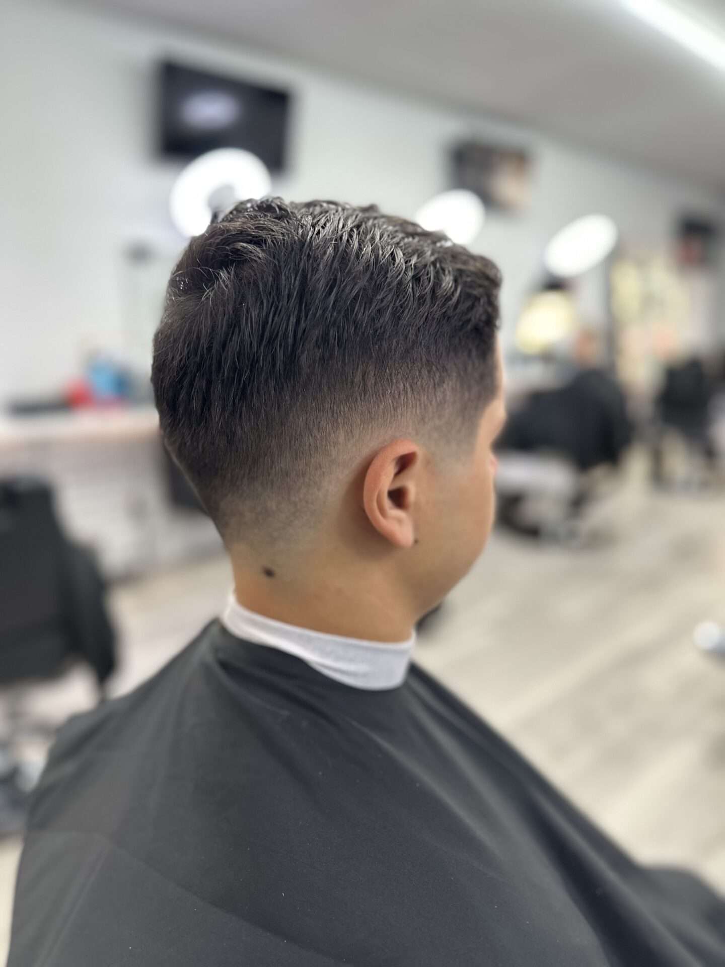 Fade haircut in Ascend the Trend barbershop in west palm beach