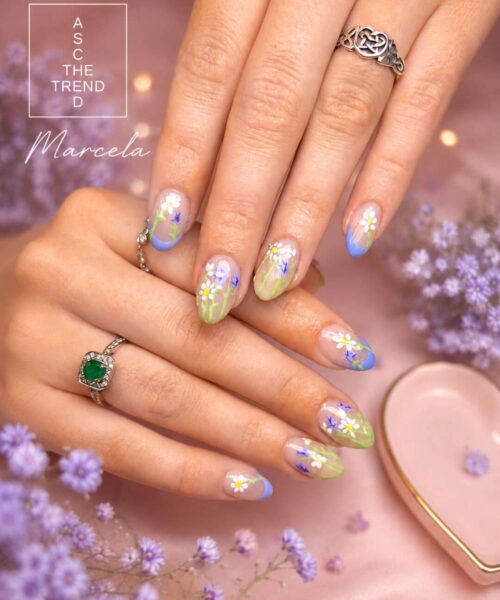 floral nail art: daisies on a blue-to-green gradient. acrylic nail short nails