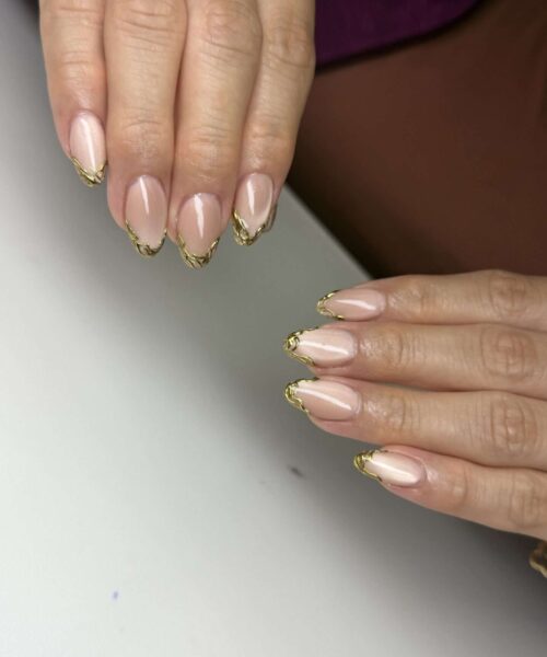 builder gel nails with nude cat eye polish and gold chrome French tip design in downtown west palm nail salon called ascend the trend nail salon.