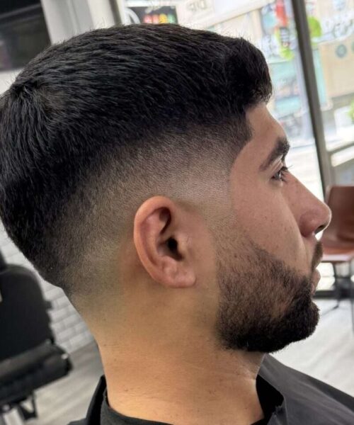 mid skin fade in west palm beach barbershop by Brian