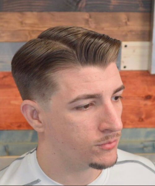 gentleman's haircut inside a barbershop in downtown west palm beach